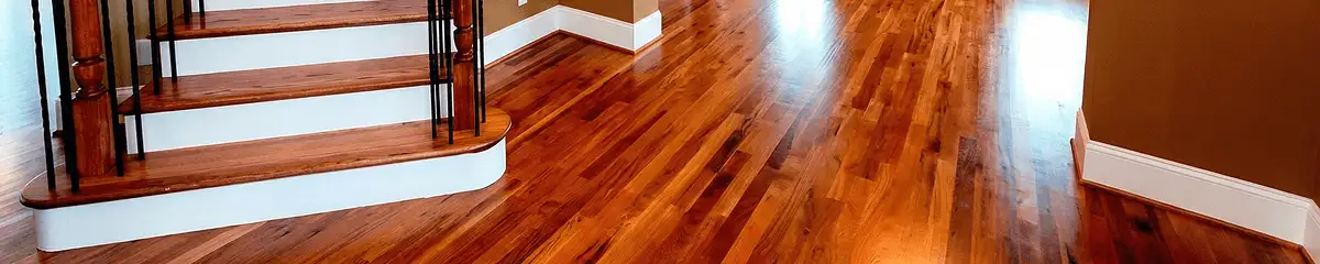 Base floor of a staircase with professionally restored wood flooring in Portland OR