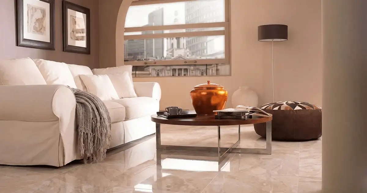 Modern living room with professionally installed marble flooring, a beige sofa, coffee table in Portland, OR