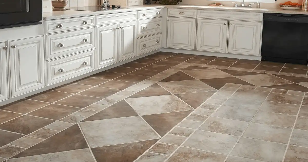 Kitchen with white cabinets and a professionally installed tile floor in Portland, OR