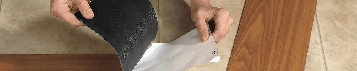 A professional installing vinyl flooring in Portland, OR
